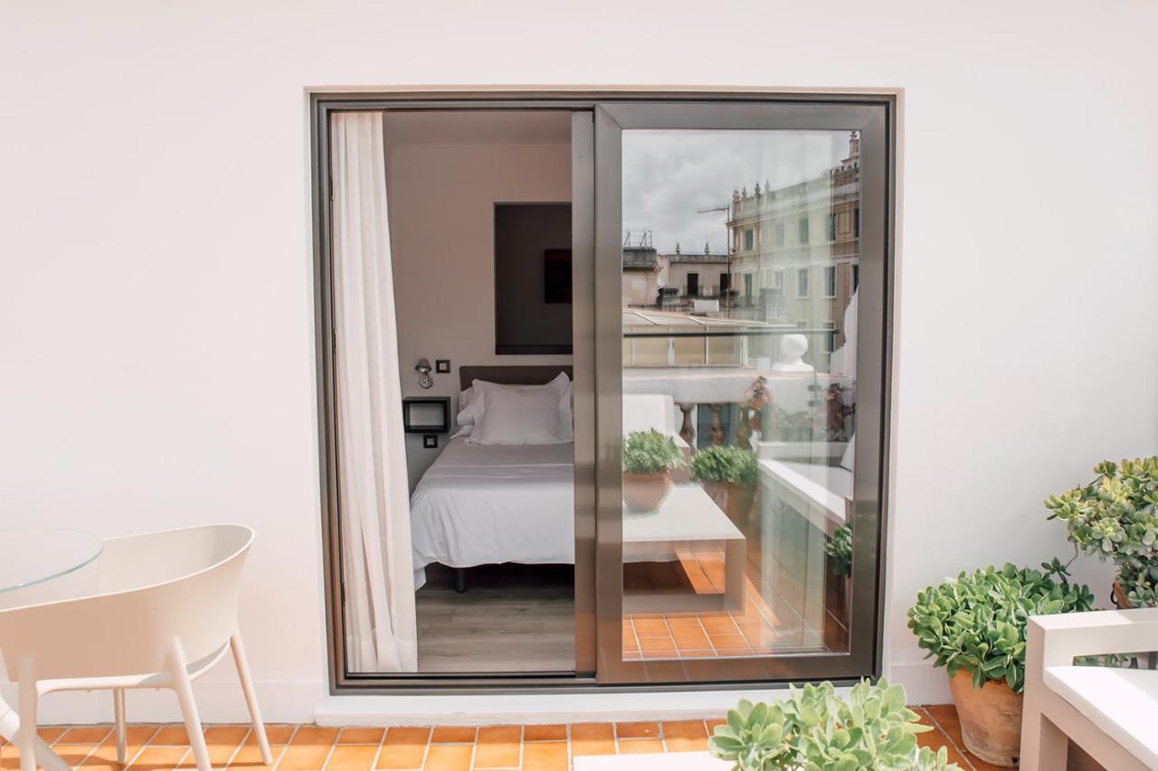 Puerta Catedral Holiday Suites Севілья Екстер'єр фото